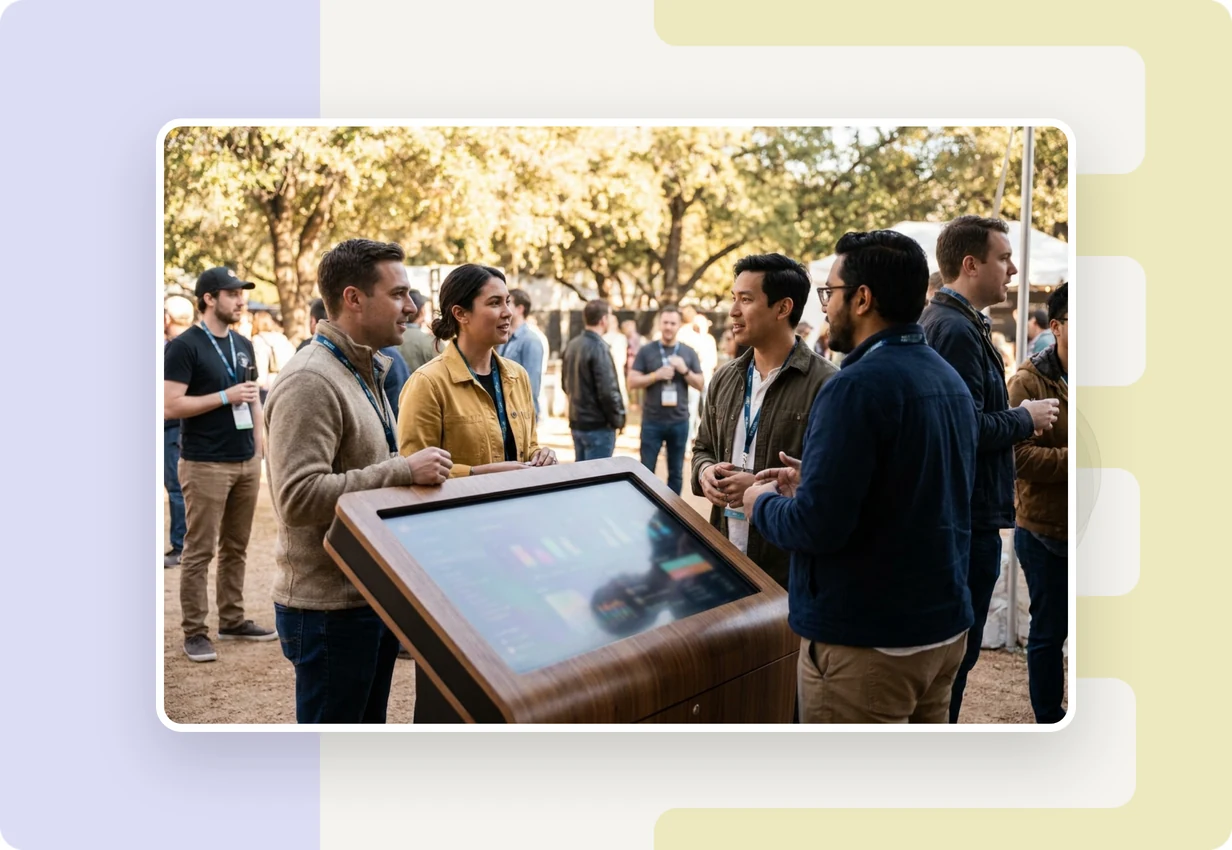 alugha at SXSW 2019: media and creative professionals watching a multilingual video at the German Pavilion booth in Austin