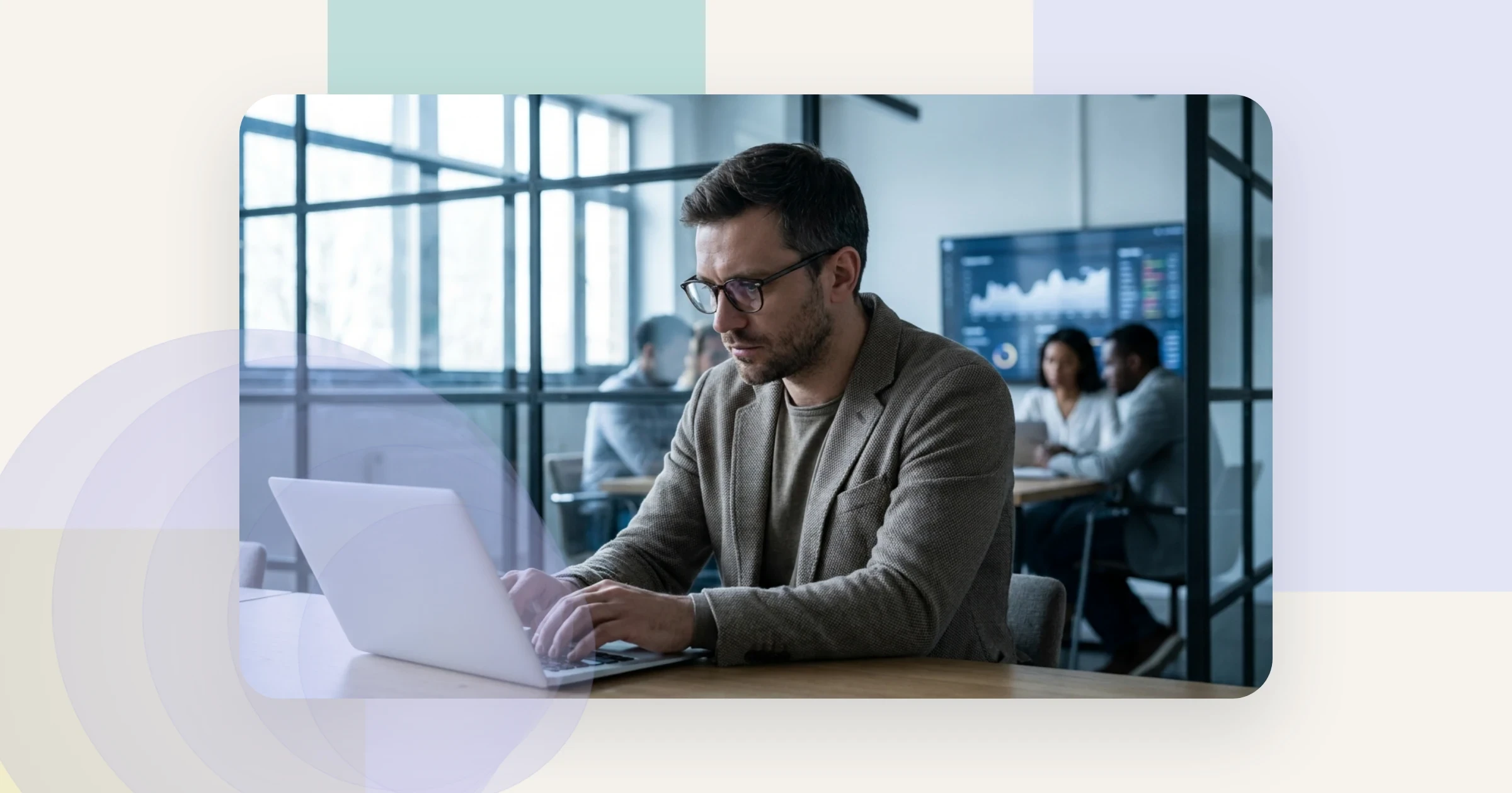 GDPR video hosting for pharma: a compliance professional reviewing data on a laptop in a secure modern office