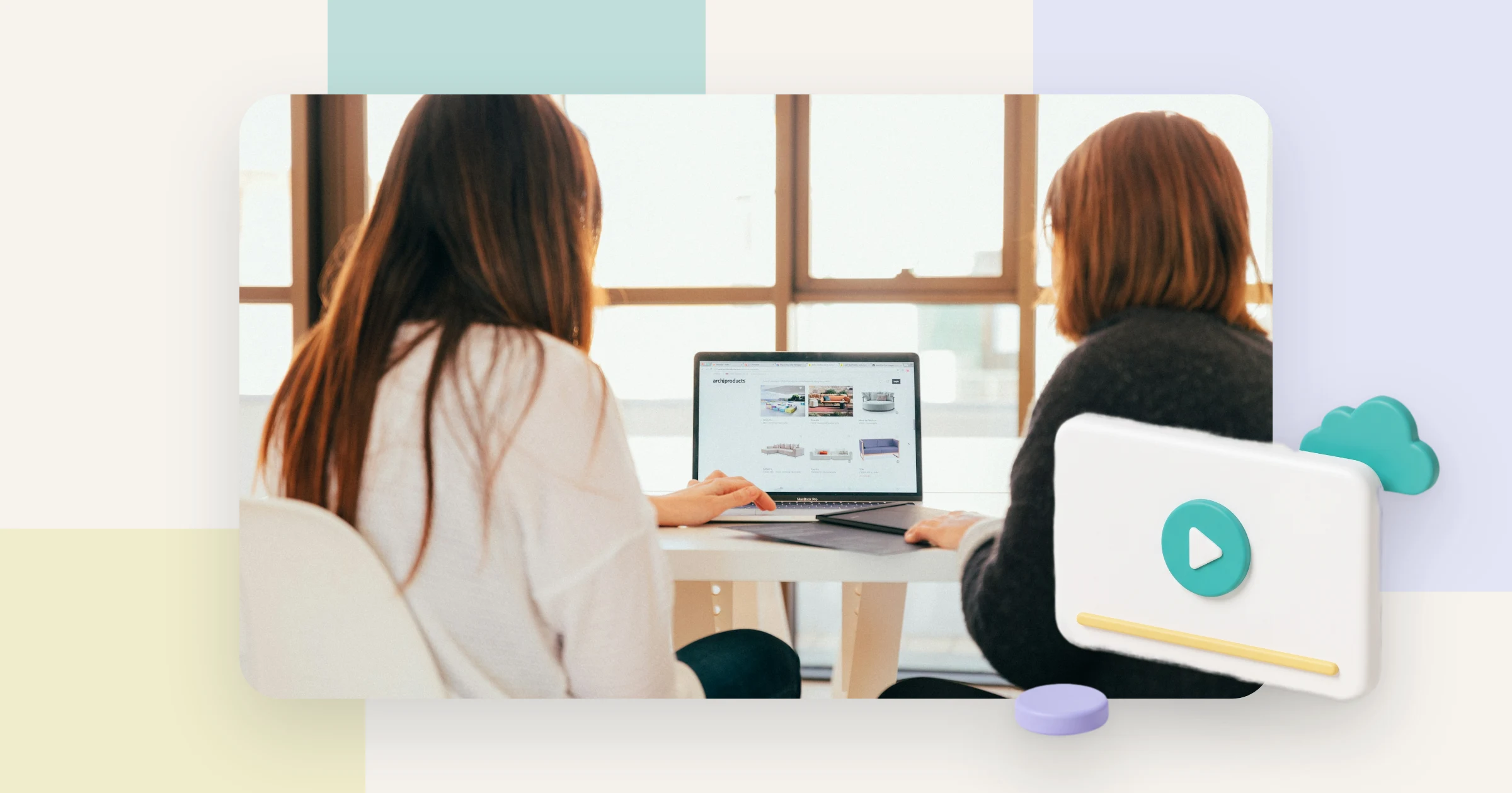Two colleagues compare video hosting platforms for business on a laptop that shows a grid of video thumbnails